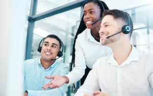 Group of call center employees working together