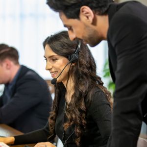 person coaching a call center agent