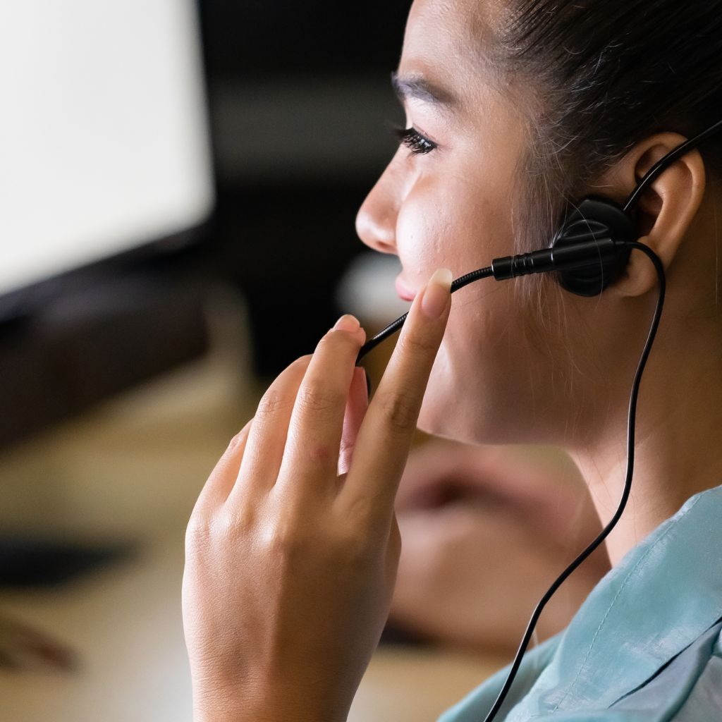 woman in call center talking to a customer