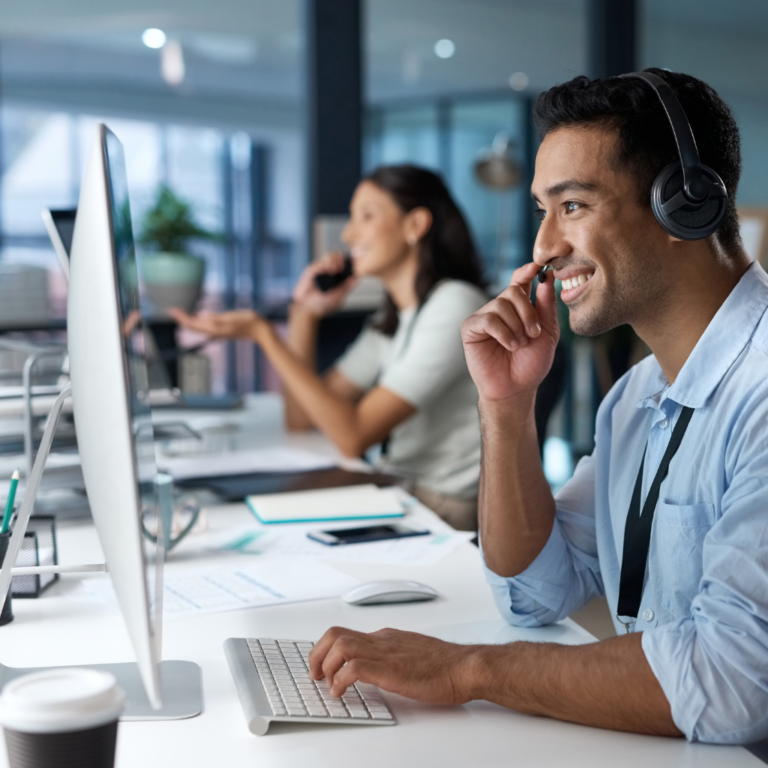 man in contact center offering support to caller, loyalty center, customer loyalty, employee satisfaction, knowledge management, agent assist